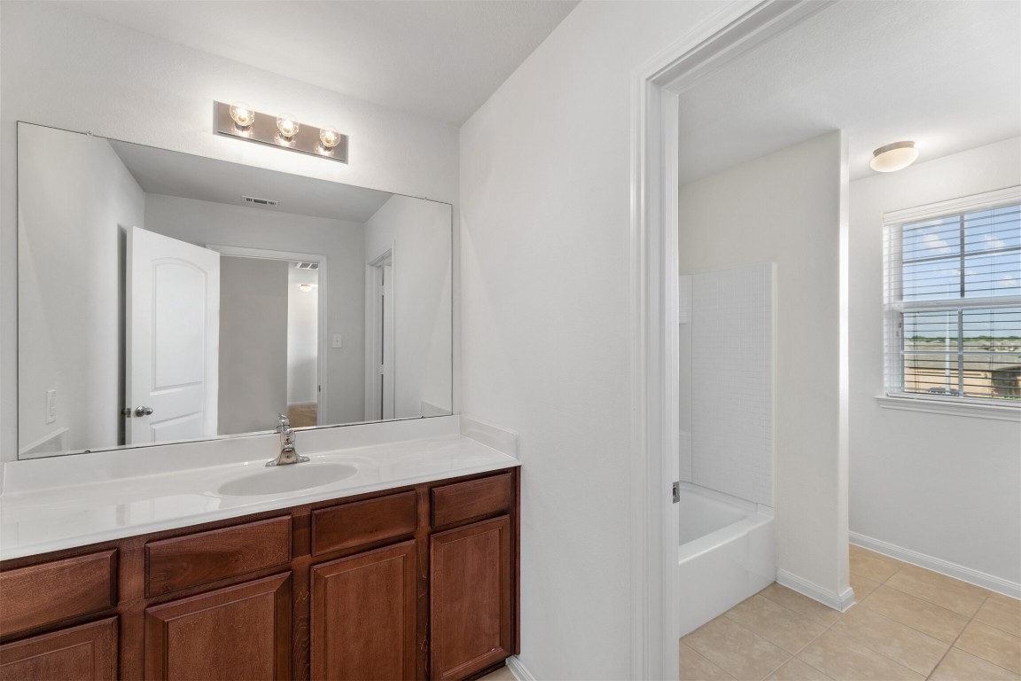 9715 Blue Sapphire Lane Rosharon, TX 77583 - Photo 17 of 30 Full secondary bathroom upstairs.