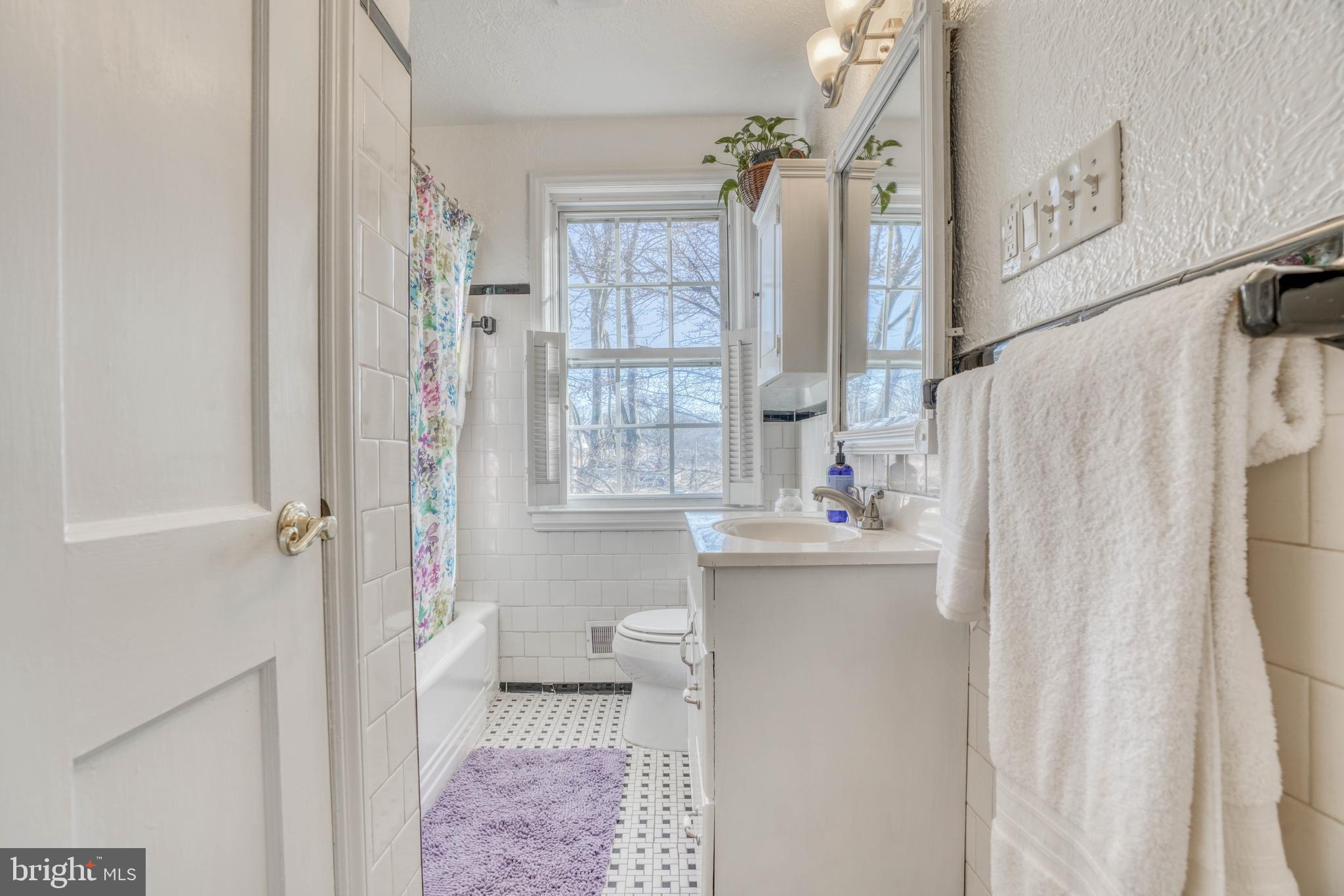 170 Dumbarton Road Baltimore, MD 21212 - Photo 43 of 50 Classic Black & White Ceramic Tile.