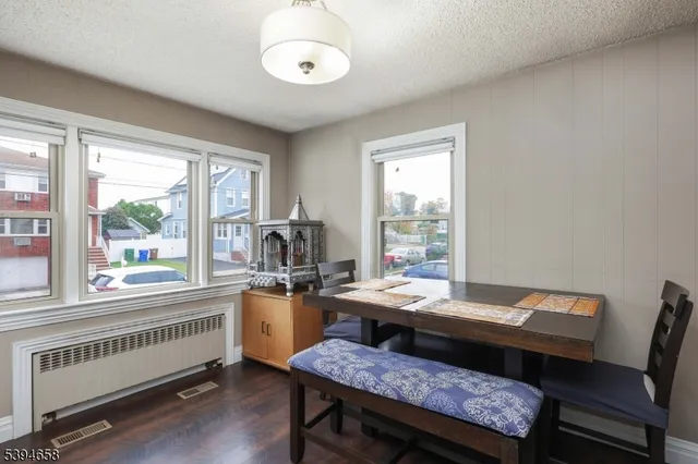 a reading room with furniture and a window