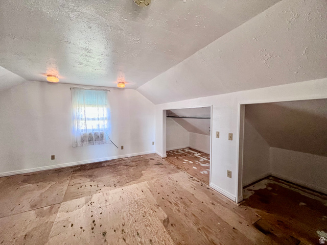 479 East 100 N Road Meadow, UT 84644 - Photo 26 of 59 Additional living space with a textured ceiling and baseboards