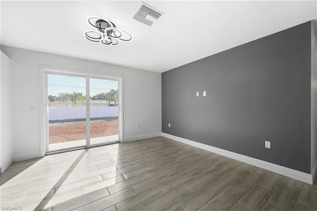 a bathroom with a toilet sink and a mirror