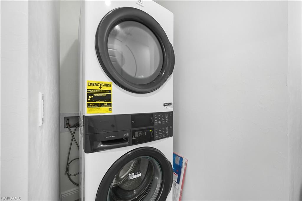 4448 18th Avenue Southwest Naples, FL 34116 - Photo 22 of 40 a utility room with dryer and washer