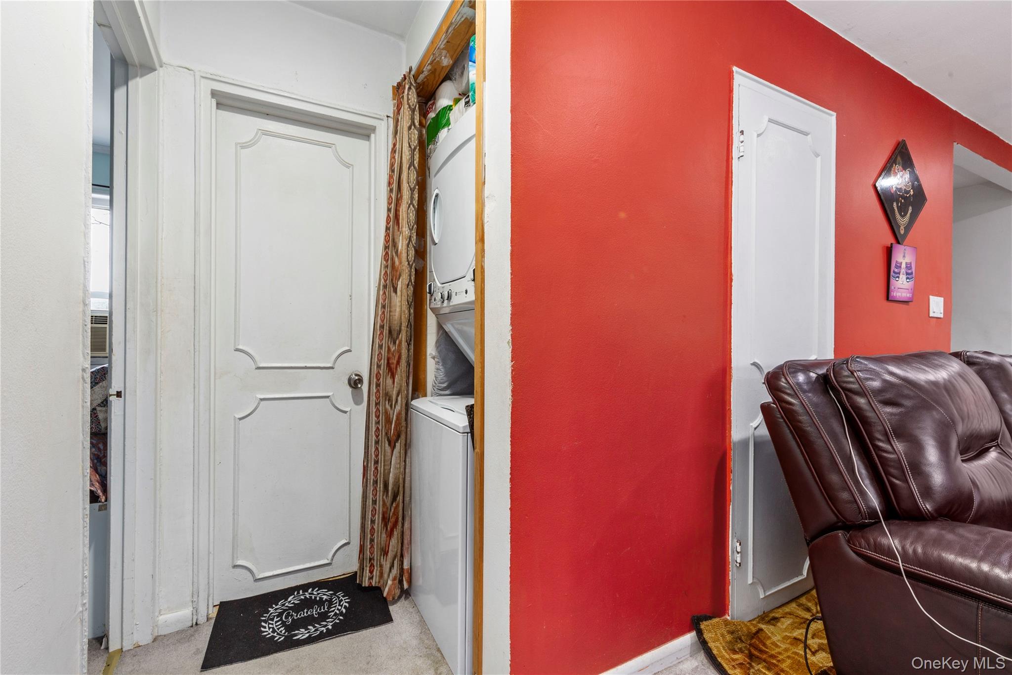 221-15 Manor Road, Unit UPPR Queens, NY 11427 - Photo 4 of 16 a bedroom with a bed and furniture