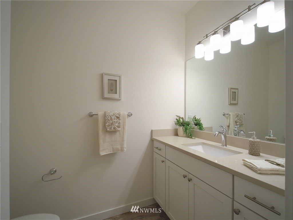 21 Snowbell Court Sequim, WA 98382 - Photo 22 of 36 a bathroom with a double vanity sink and mirror
