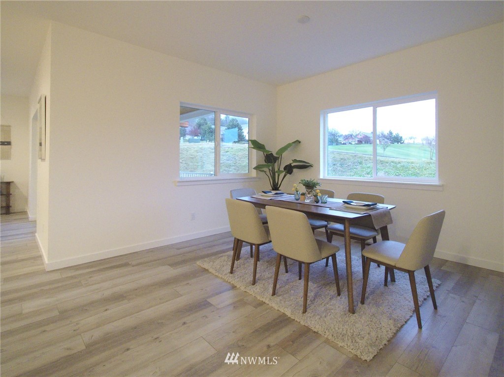 21 Snowbell Court Sequim, WA 98382 - Photo 8 of 36 a dining room with furniture and window