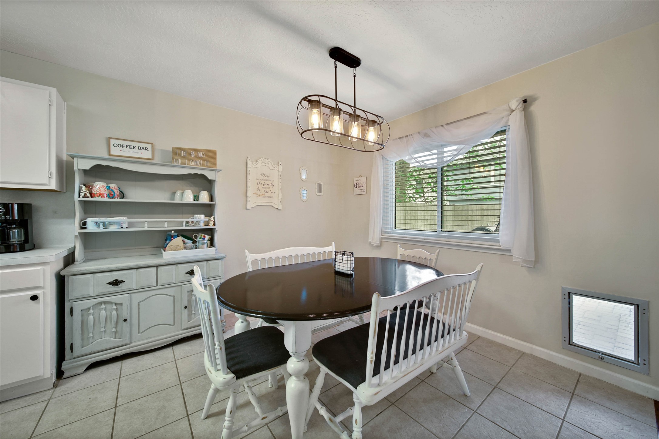 4843 Drew Forest Lane Humble, TX 77346 - Photo 15 of 37 The breakfast nook overlooks the peaceful backyard and is a large space! The previous owners installed a pet door, but you could block it off if that is not something you need.