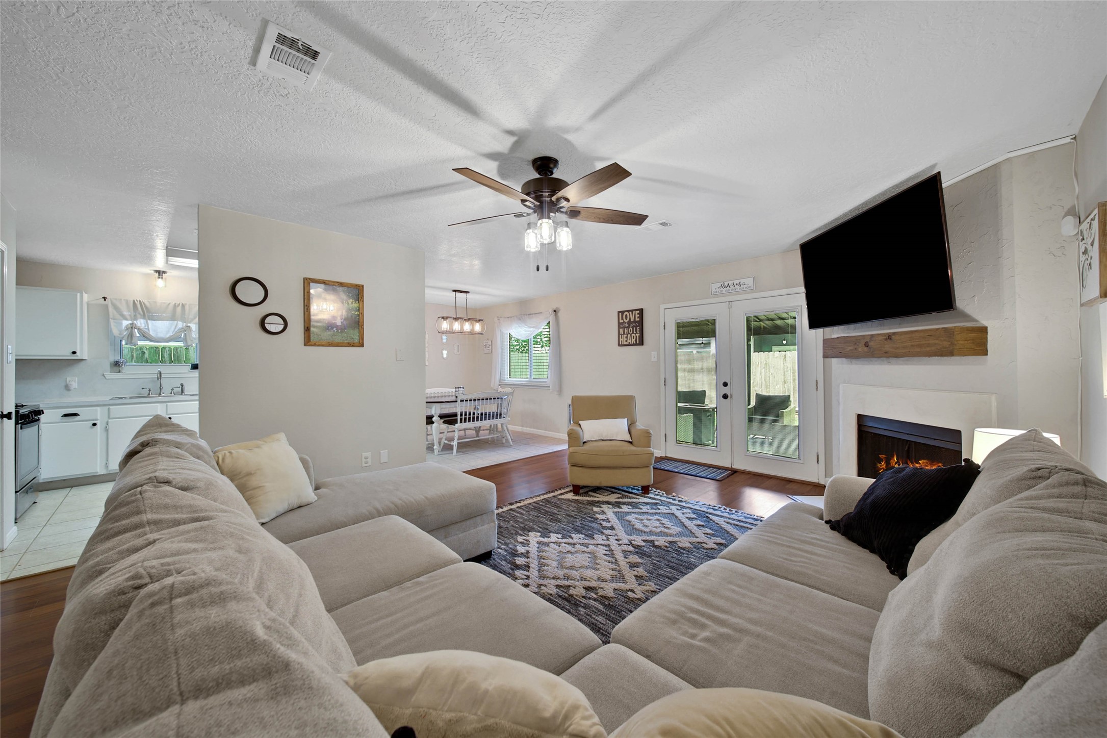 4843 Drew Forest Lane Humble, TX 77346 - Photo 19 of 37 Another angle showing how open the living room is to the kitchen.