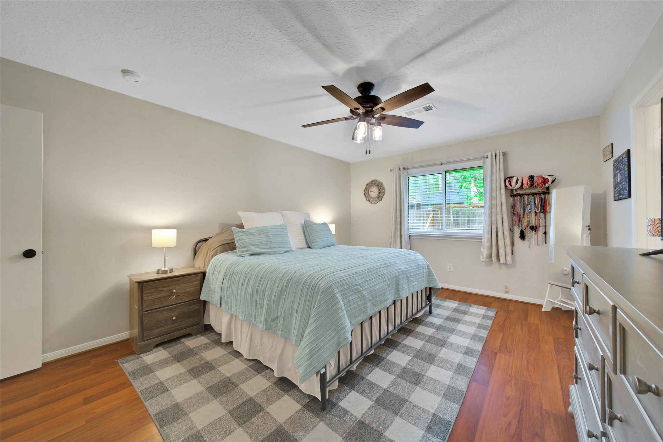 4843 Drew Forest Lane Humble, TX 77346 - Photo 21 of 37 The primary bedroom is large enough for a king size bed and additional furniture.
