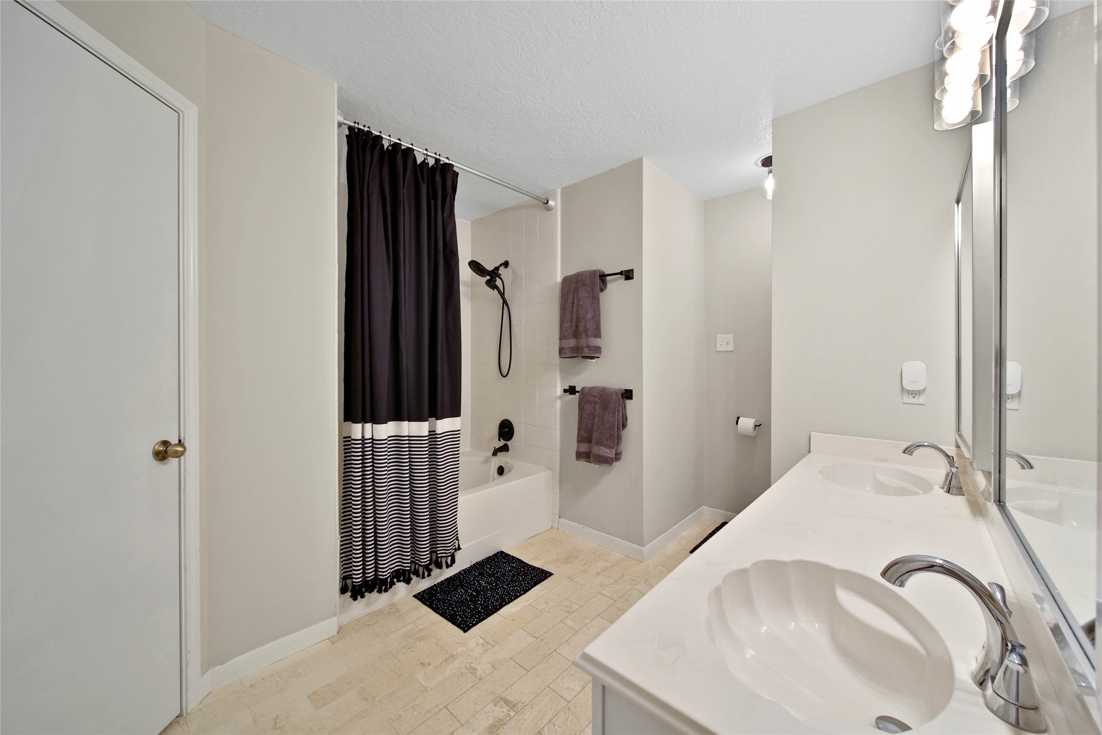 4843 Drew Forest Lane Humble, TX 77346 - Photo 26 of 37 This shower/tub combo features updated fixtures.