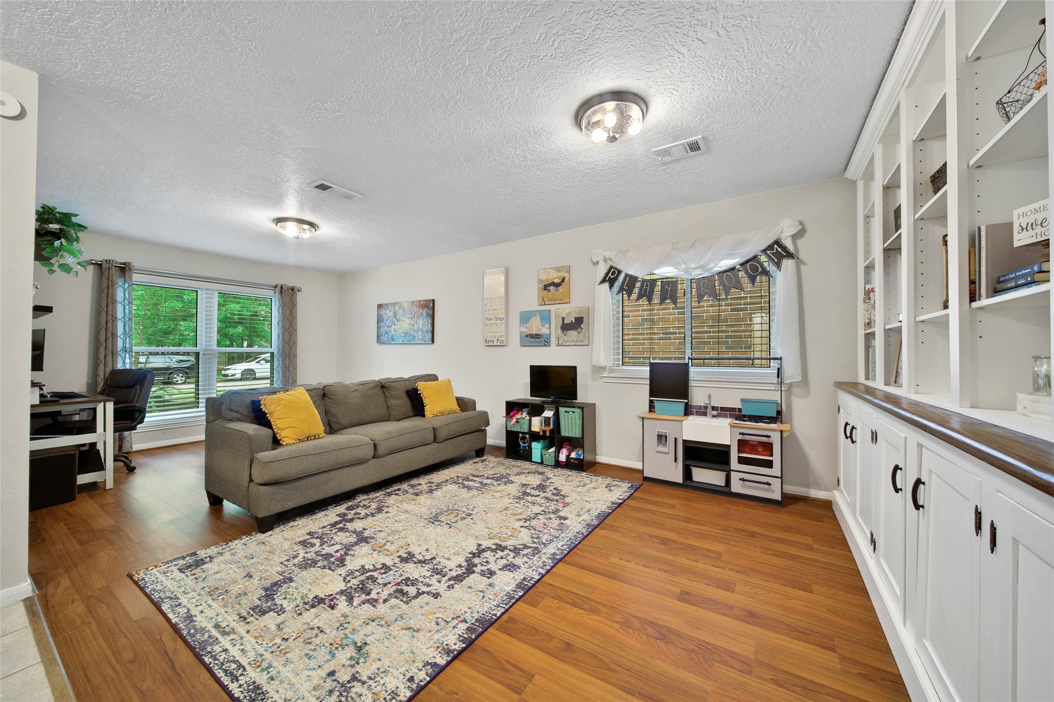 4843 Drew Forest Lane Humble, TX 77346 - Photo 5 of 37 Technically a dining room, this area is currently being utilized as a play room.