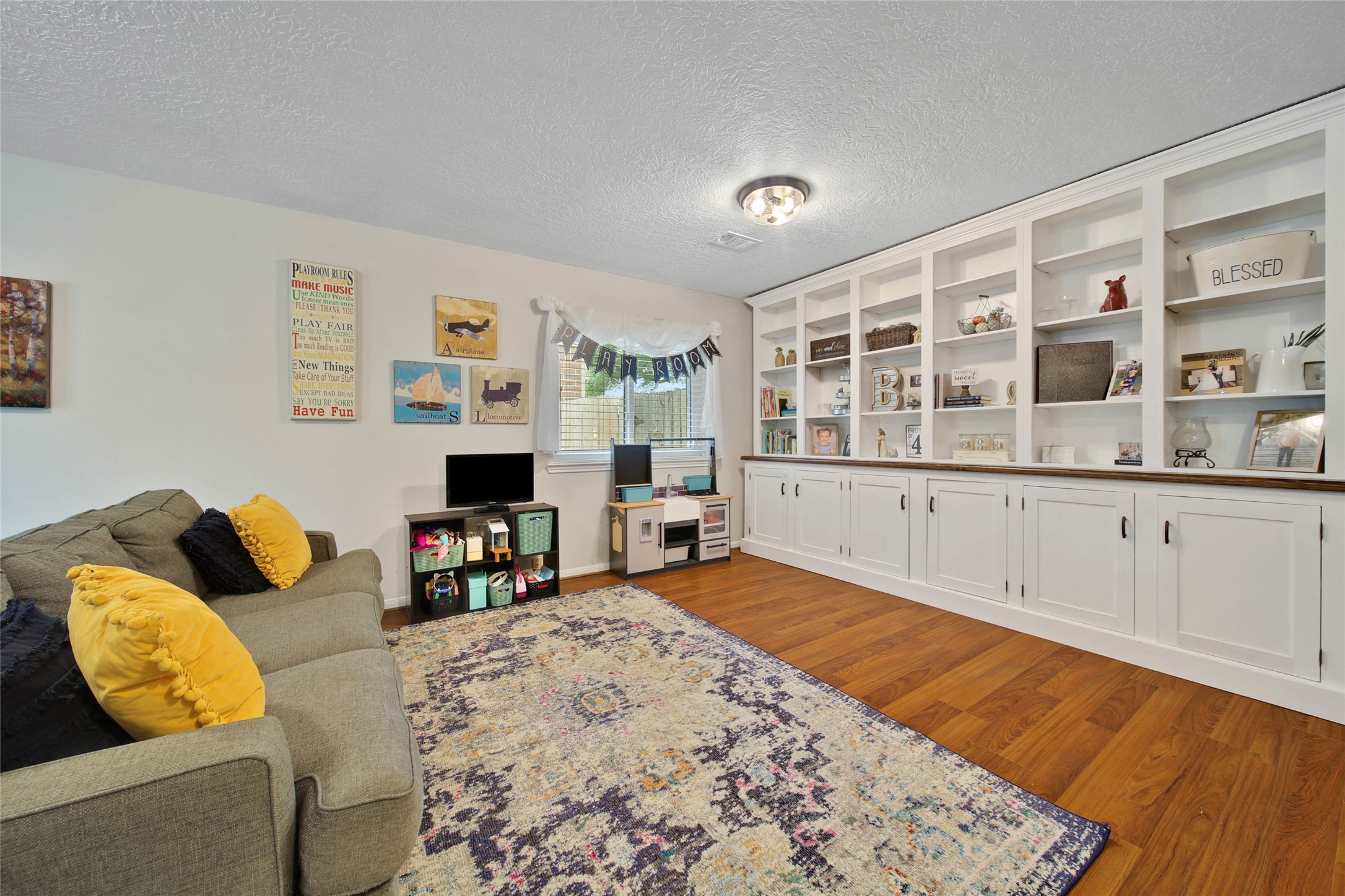 4843 Drew Forest Lane Humble, TX 77346 - Photo 6 of 37 Look at these gorgeous built ins that have tons of storage!