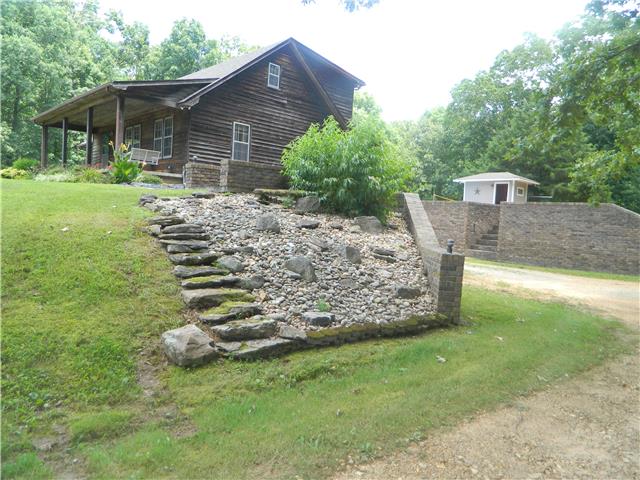 3897 Grandaddy Road Lawrenceburg, TN 38464 - Photo 3 of 20 landscaping , rocking chair front porch
