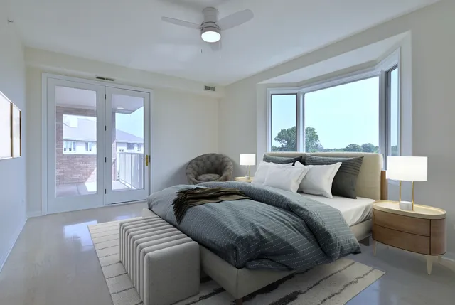 a bedroom with a bed and bathroom