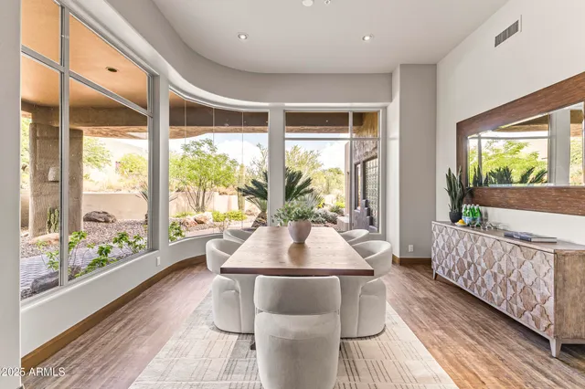 a living room with fireplace furniture and a flat screen tv