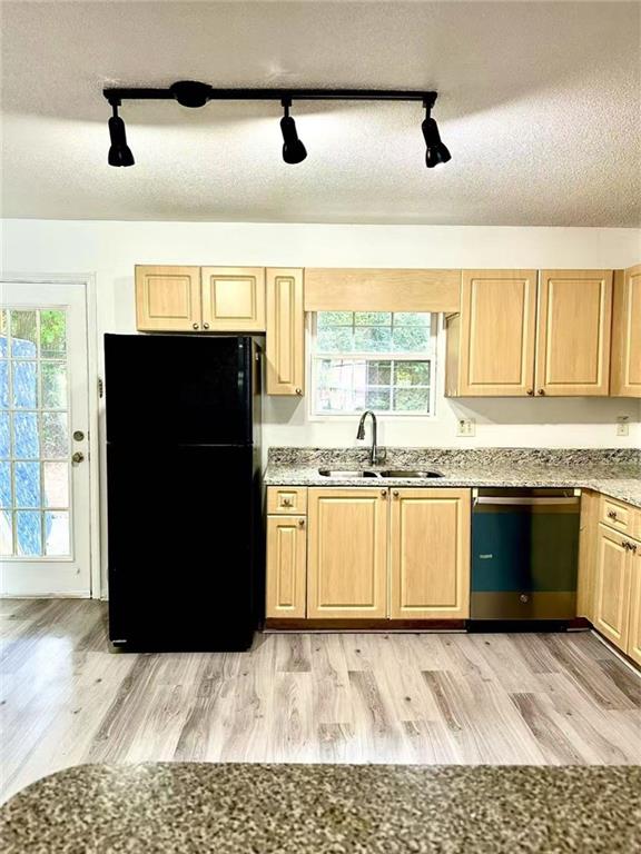 3665 Chestnut Drive, Unit F2 Atlanta, GA 30340 - Photo 11 of 21 a kitchen with a refrigerator and a sink