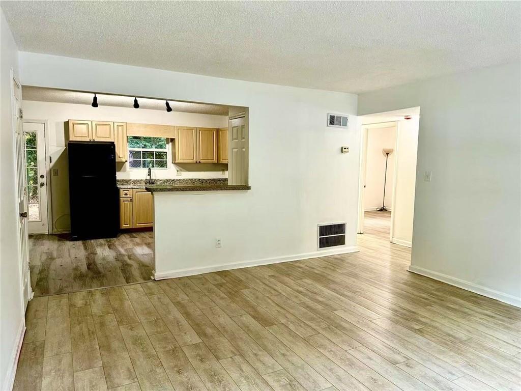 3665 Chestnut Drive, Unit F2 Atlanta, GA 30340 - Photo 13 of 21 a view of a livingroom with wooden floor