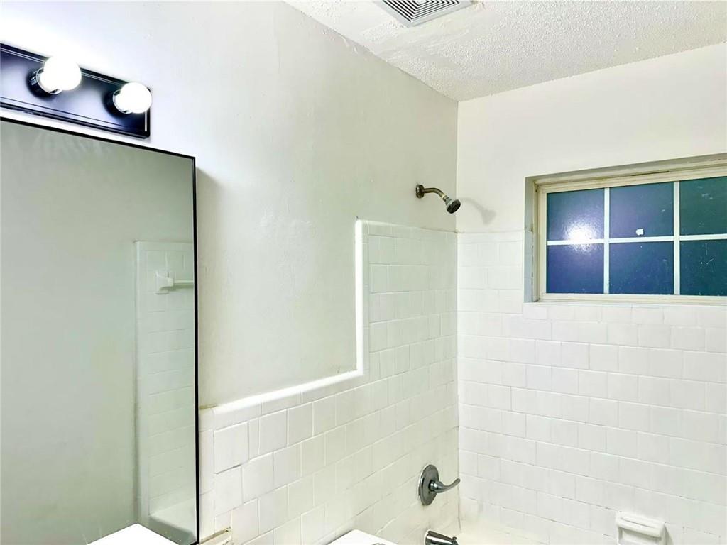 3665 Chestnut Drive, Unit F2 Atlanta, GA 30340 - Photo 16 of 21 a bathroom with a shower