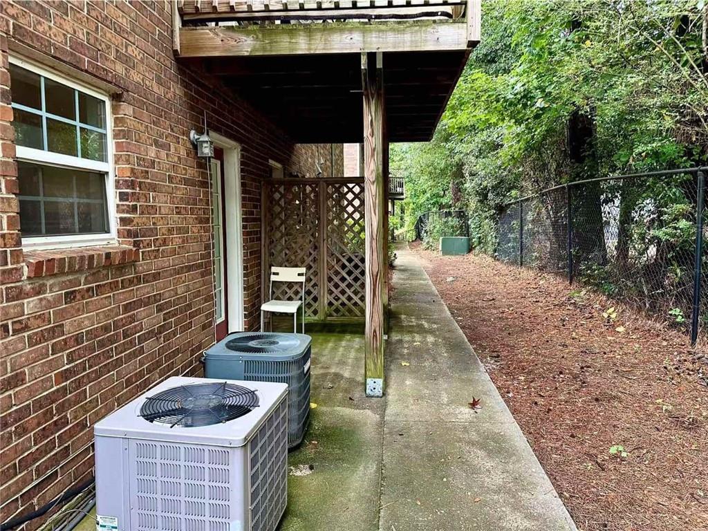 3665 Chestnut Drive, Unit F2 Atlanta, GA 30340 - Photo 17 of 21 a backyard of a house with seating space