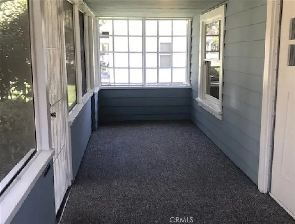 558 East 9th Street Upland, CA 91786 - Photo 6 of 10 a bathroom with a bathtub and a window