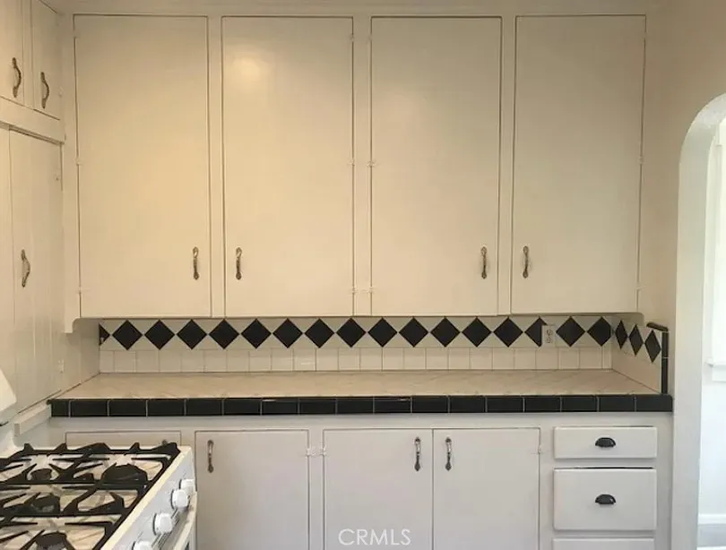 558 East 9th Street Upland, CA 91786 - Photo 7 of 10 a bathroom with a sink and a mirror