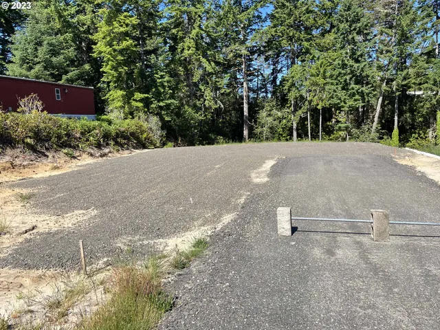 a view of a road with a yard