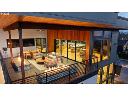 a room with furniture and large window