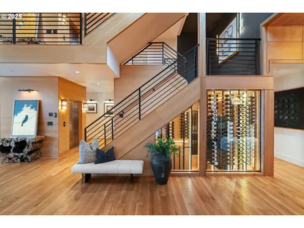 a view of an entryway with wooden floor