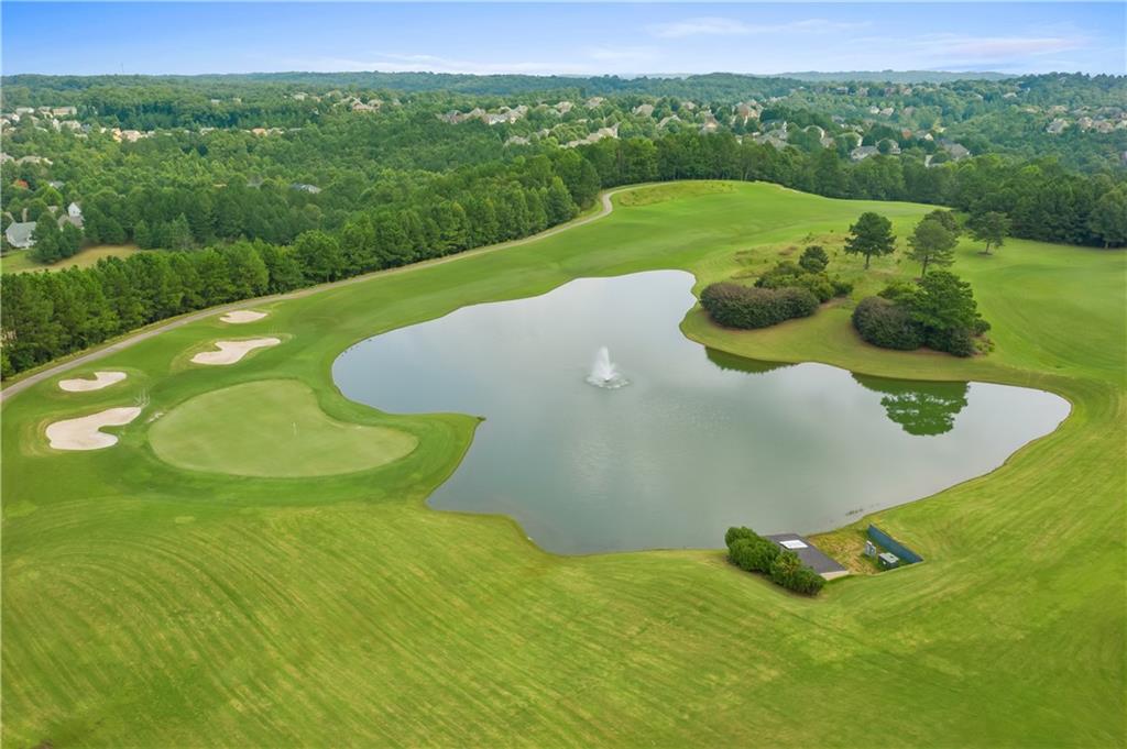 3975 Sweeting Street Cumming, GA 30041 - Photo 65 of 69 a view of a golf course with a garden