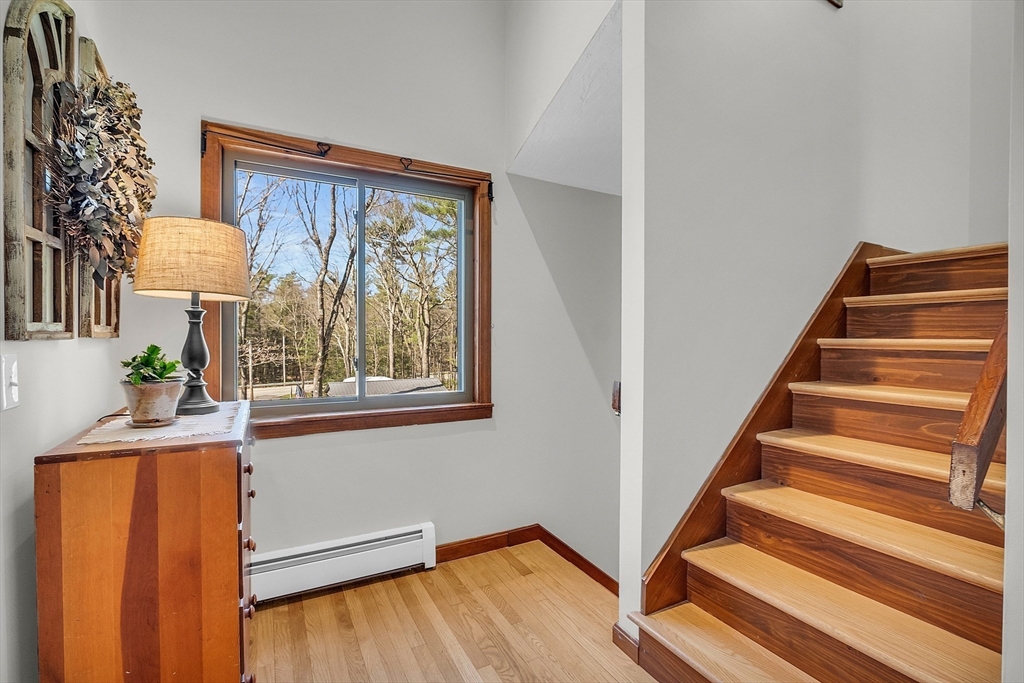 337 Hubbardston Road Princeton, MA 01541 - Photo 21 of 42 a view of entryway and hall with wooden floor