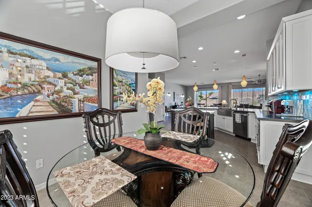 a view of a dining room with furniture window and outside view
