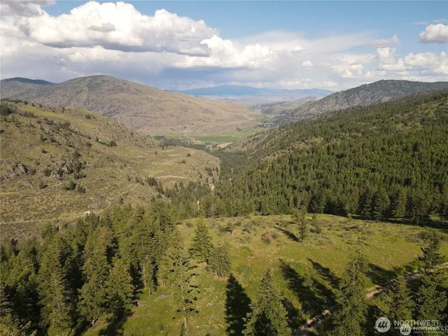 a view of mountain view with mountains in the background