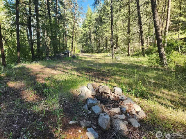 a view of a lake with a yard
