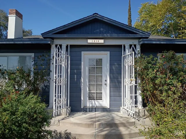 a front view of a house with a porch
