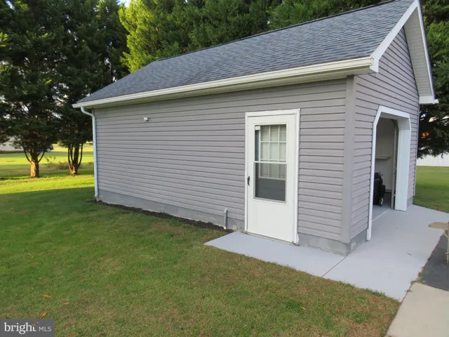 a view of a backyard with a garden
