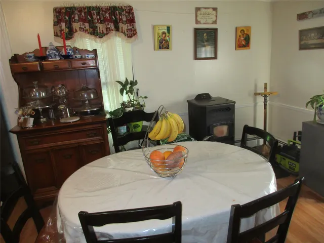 a bedroom with a bed and a table in it