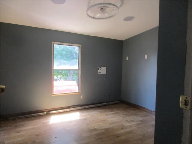 a white bath tub sitting in a bathroom