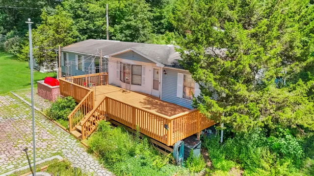 an aerial view of a house with balcony