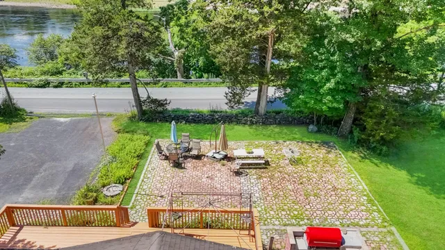 a view of a park with plants and a bench