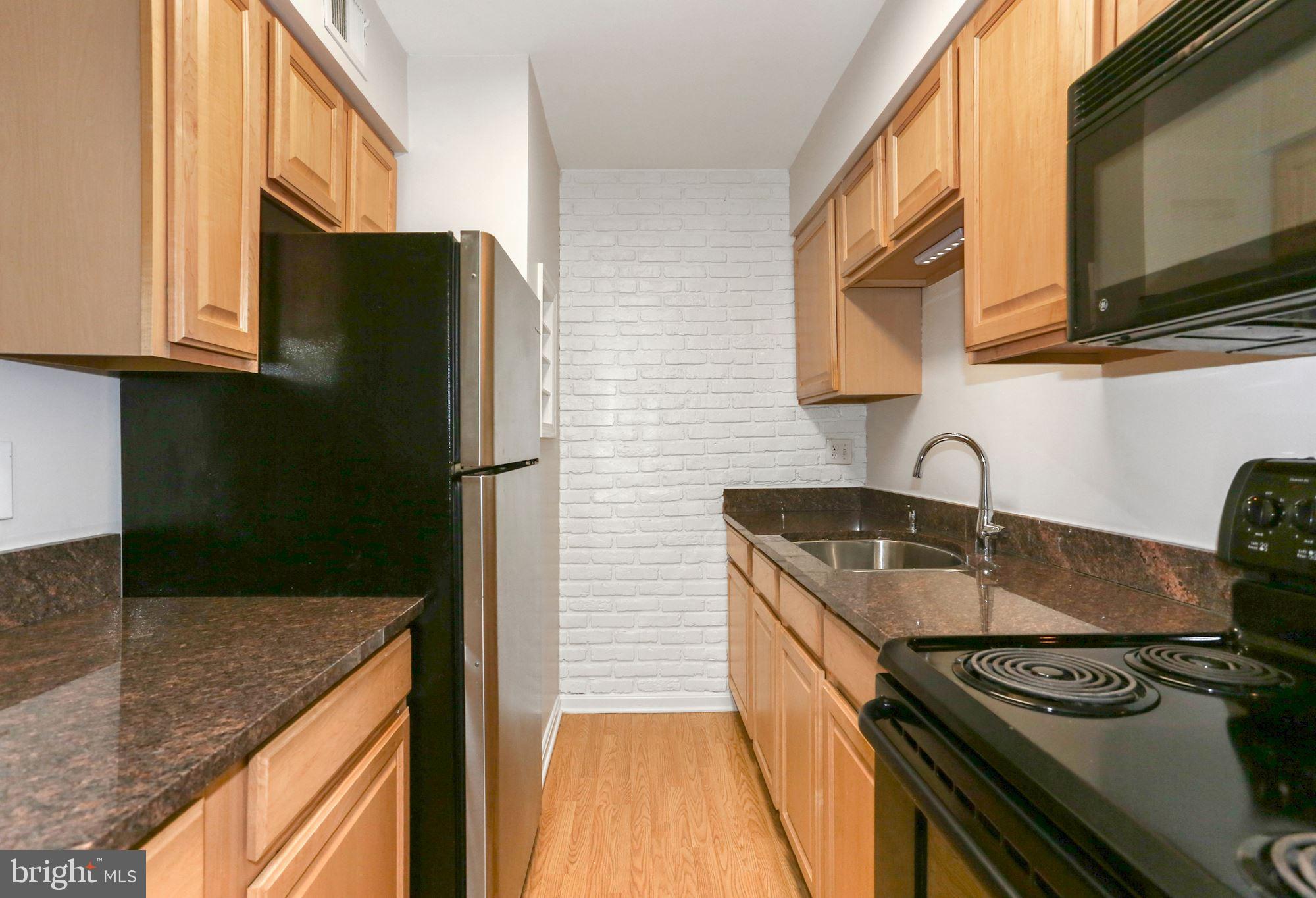 8110 E Colony Point Road, Unit 218 Springfield, VA 22152 - Photo 15 of 40 Remodeled Kitchen