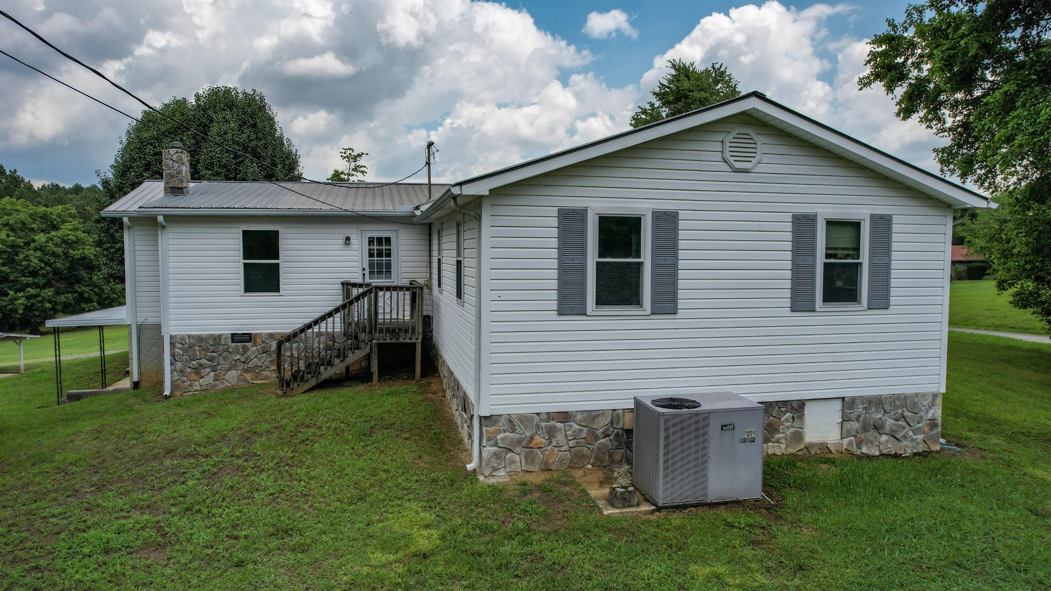 428 Caldwell Road Southeast Cleveland, TN 37323 - Photo 5 of 91 a view of a house with a yard