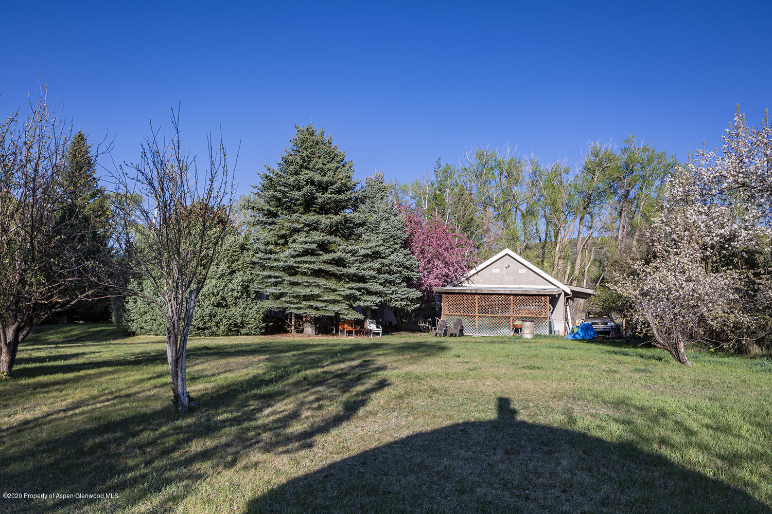 513 North Thomas Road Carbondale, CO 81623 - Photo 9 of 23 a front view of a house with a yard