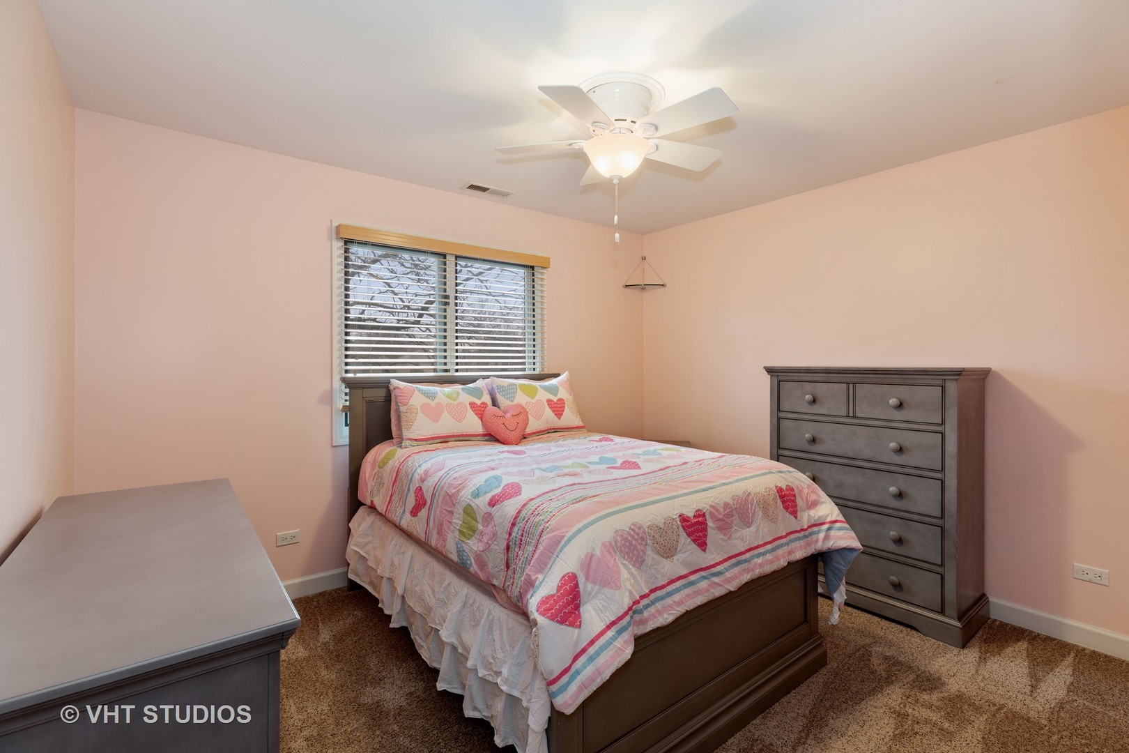 2126 Pine Road Homewood, IL 60430 - Photo 16 of 22 a bedroom with a bed and a chandelier
