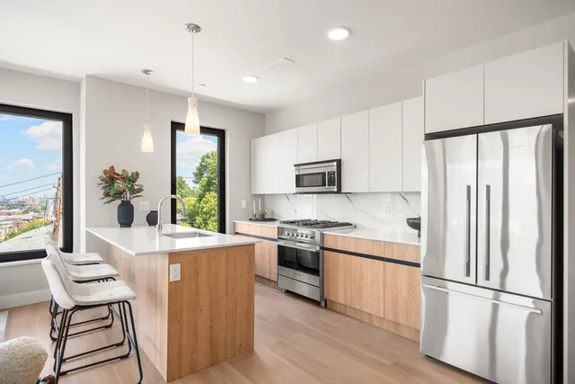 $1,050,000 | 249 Corey Road, Unit 401, Boston, MA 02135