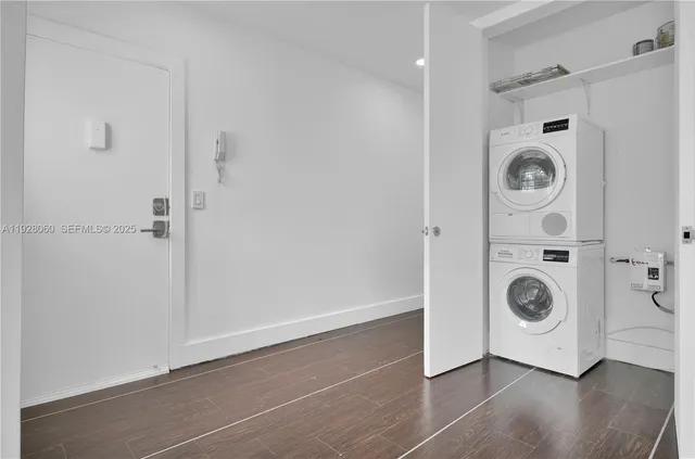 a view of washer and dryer in a utility room