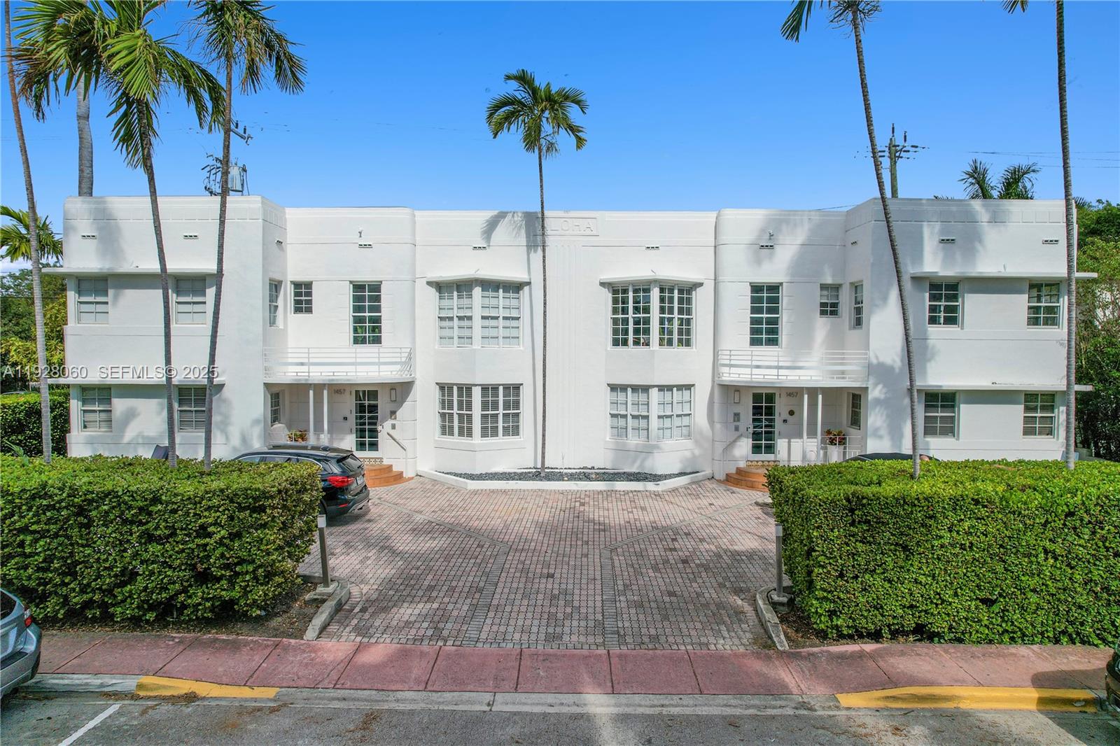 1457 Meridian Avenue, Unit 204 Miami Beach, FL 33139 - Photo 15 of 20 a view of multiple houses with a yard