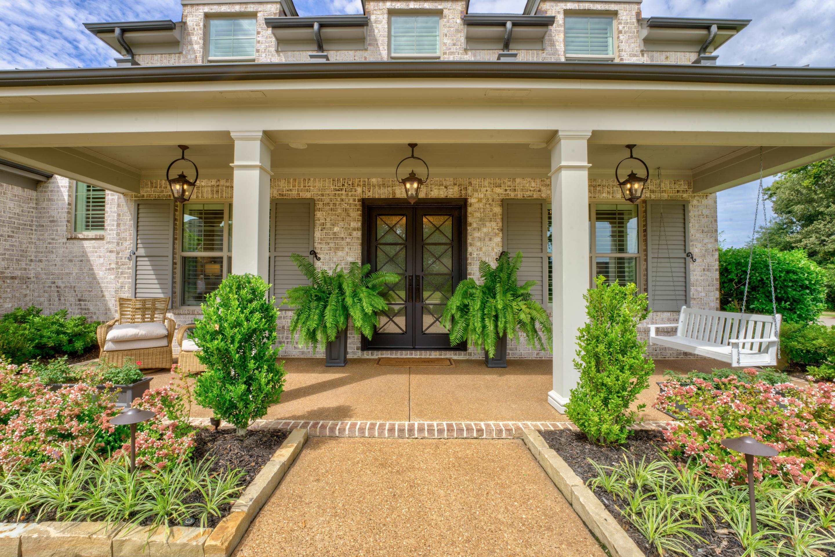 1237 Monroe Hill Circle West Collierville, TN 38017 - Photo 2 of 37 View of exterior entry featuring a porch
