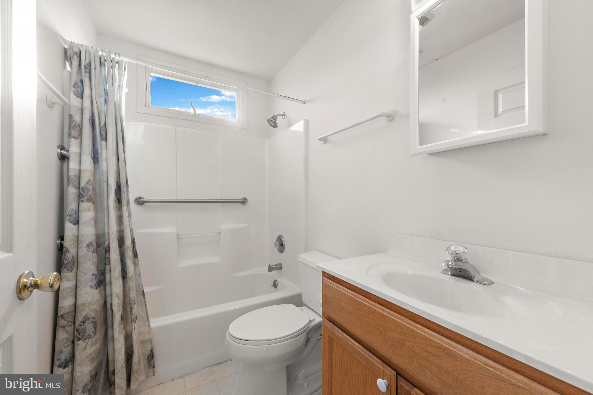 108 West 22nd Street Ship Bottom, NJ 08008 - Photo 54 of 66 a bathroom with a sink toilet and shower