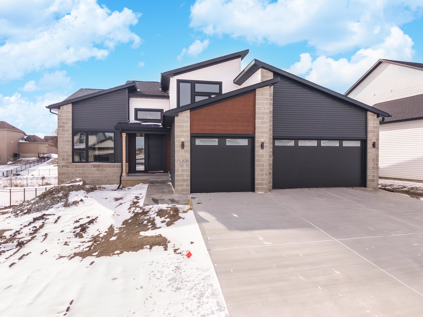 5303 Finlen Lane Bloomington, IL 61705 - Photo 1 of 58 a front view of a house with a yard