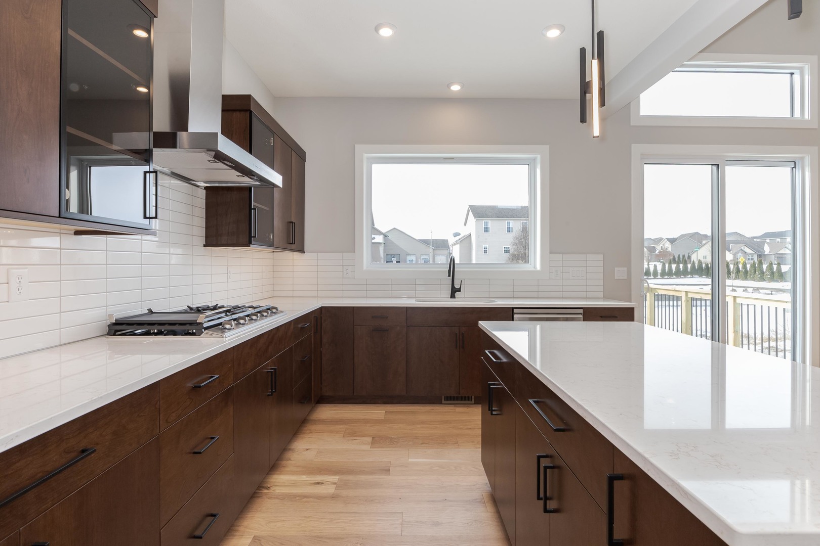 5303 Finlen Lane Bloomington, IL 61705 - Photo 21 of 58 a kitchen with stainless steel appliances granite countertop a sink stove and refrigerator