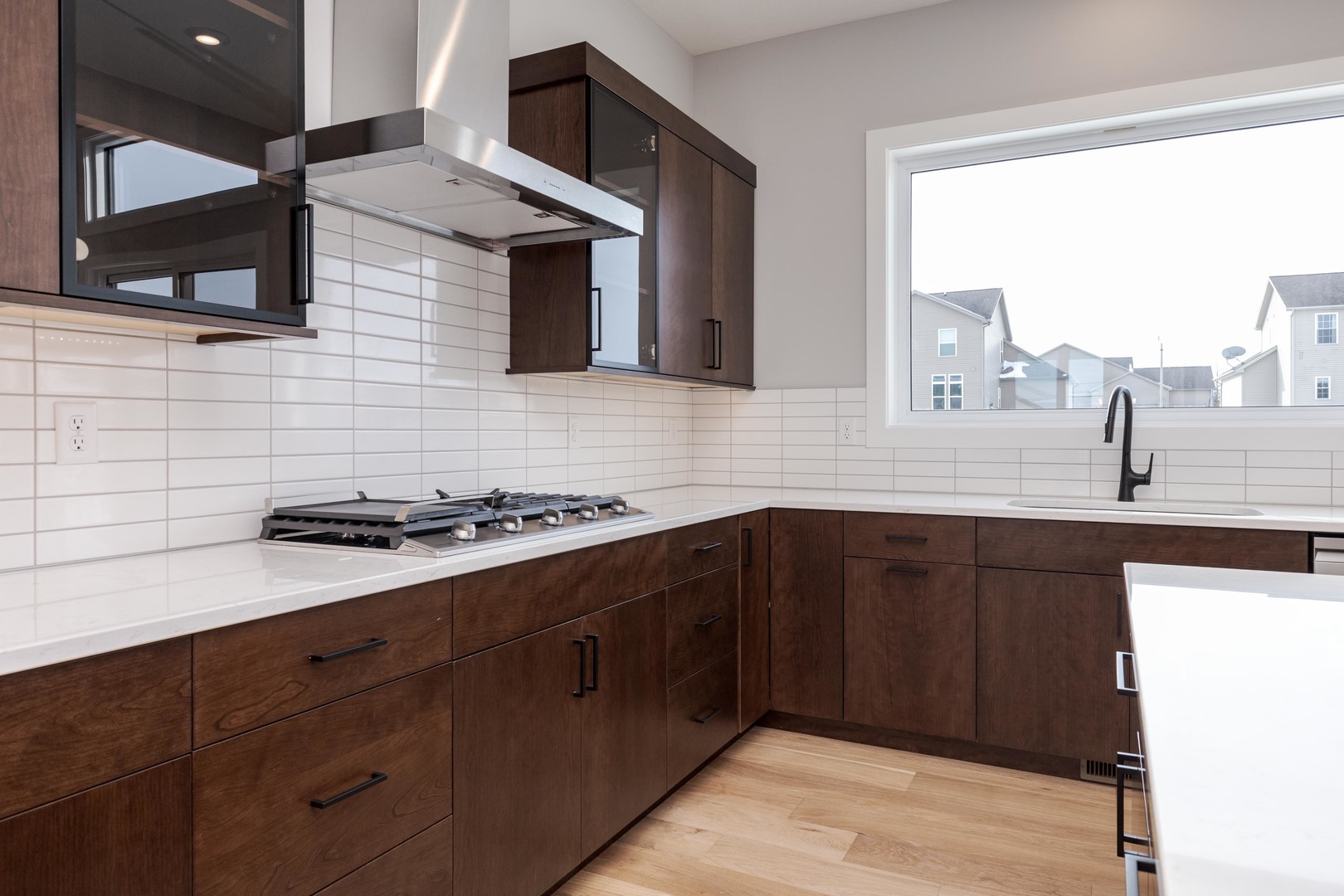 5303 Finlen Lane Bloomington, IL 61705 - Photo 23 of 58 a kitchen with stainless steel appliances a stove microwave and cabinets